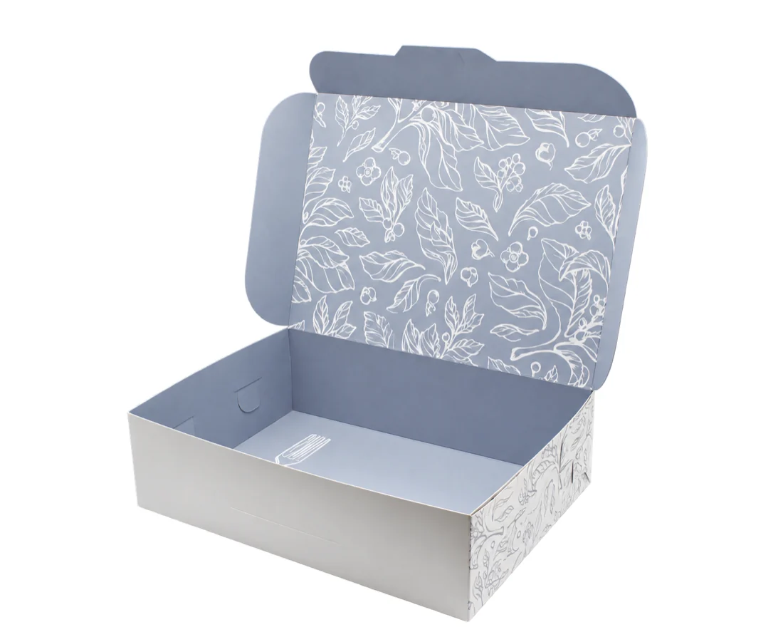 Caja plegadiza con impresión interior de motivos botánicos